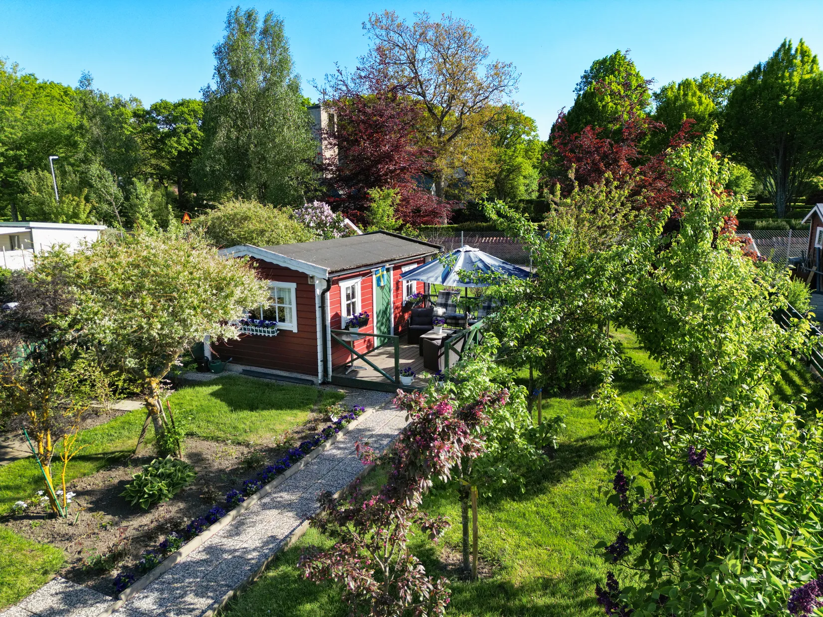 Fritidshus, Kapelluddens koloniförening, Kyrkogårdsgatan 21, Höganäs