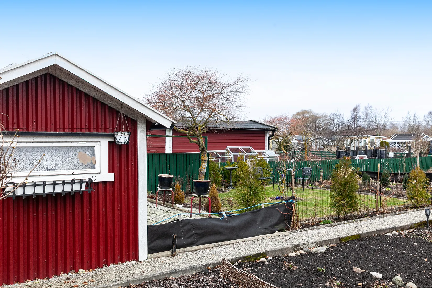 Fritidshus, Kapelluddens koloniförening, Kyrkogårdsgatan 21, Höganäs