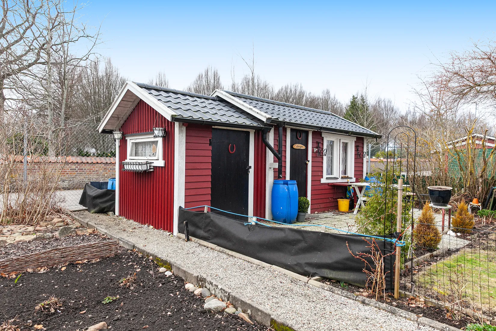 Fritidshus, Kapelluddens koloniförening, Kyrkogårdsgatan 21, Höganäs